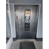 Новые металлические подъездные двери по ул.Дизайнеров